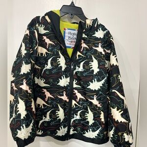 Holly &Beau raincoat dinosaurs- change color in rain. Used but good condition.